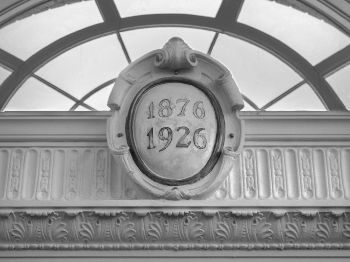 Historic architectural date detail inside the former Farmers Bank building